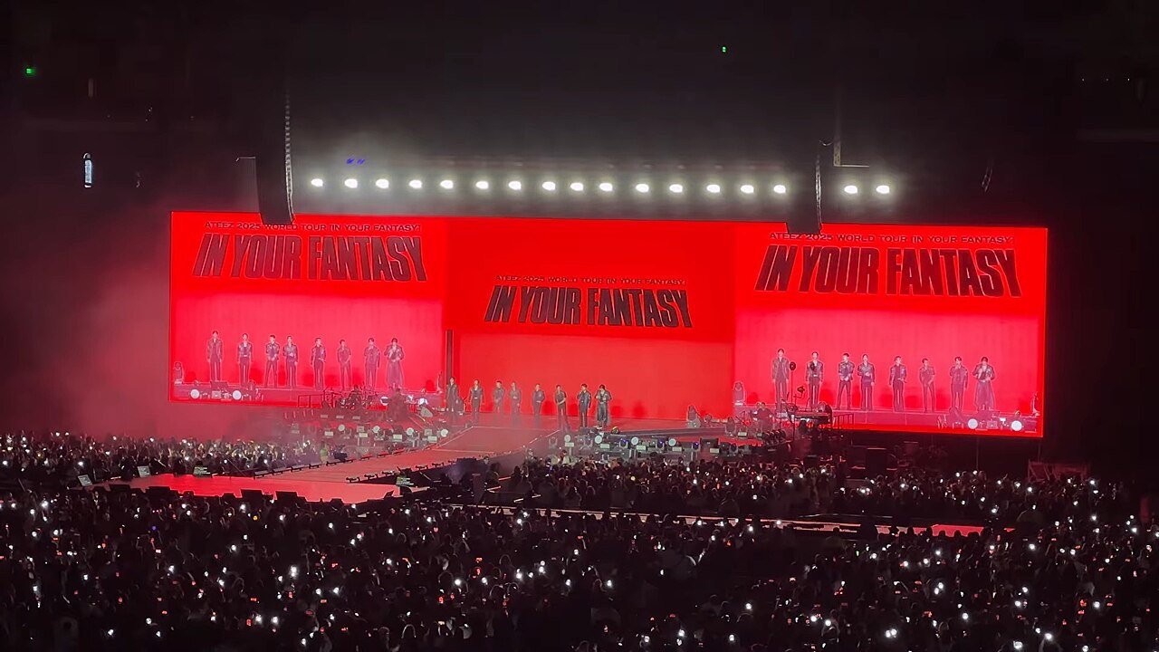 ATEEZ on stage at BMO Stadium in 2025 with fans' lightsticks