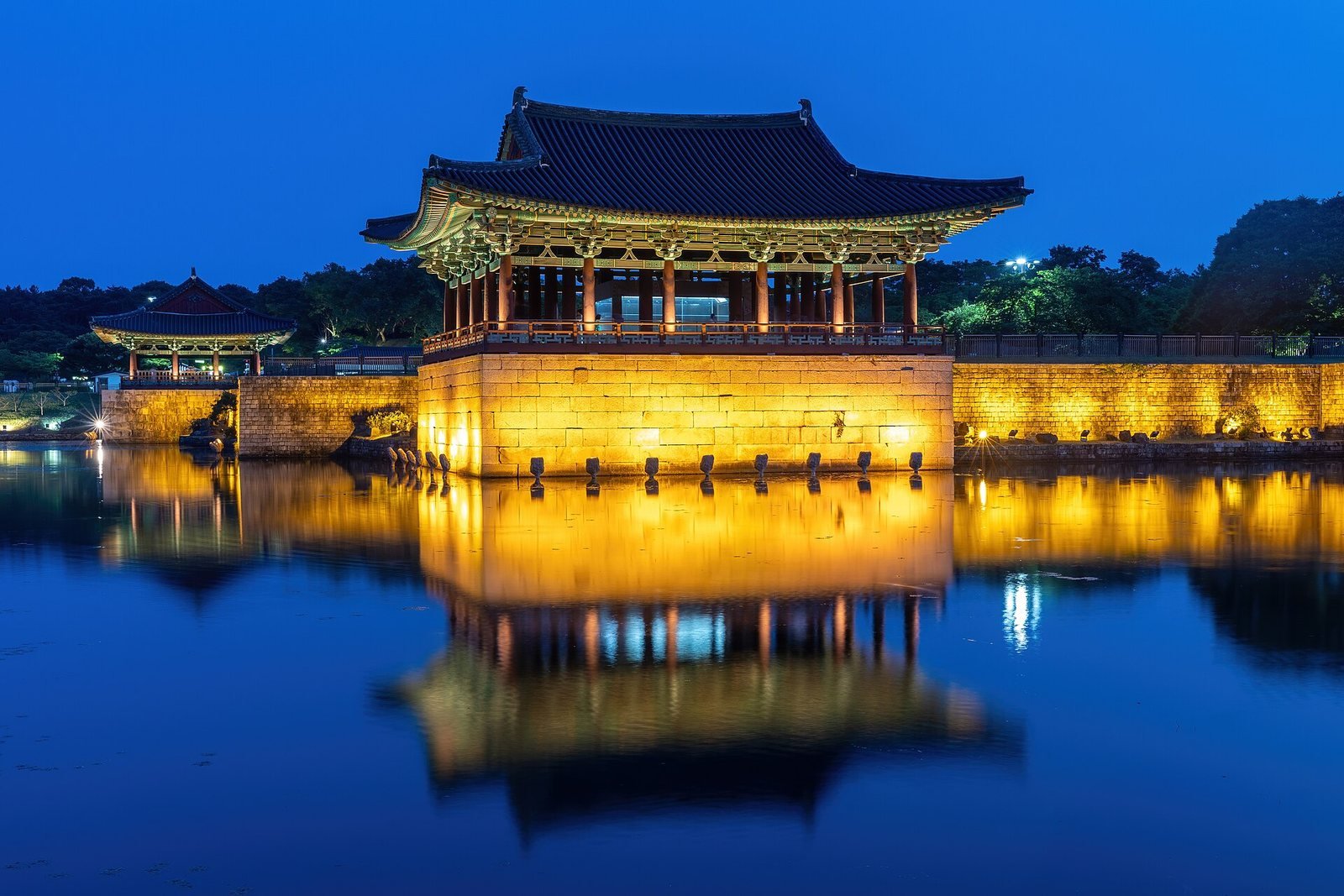Donggung Palace reflected in Wolji Pond at blue hour